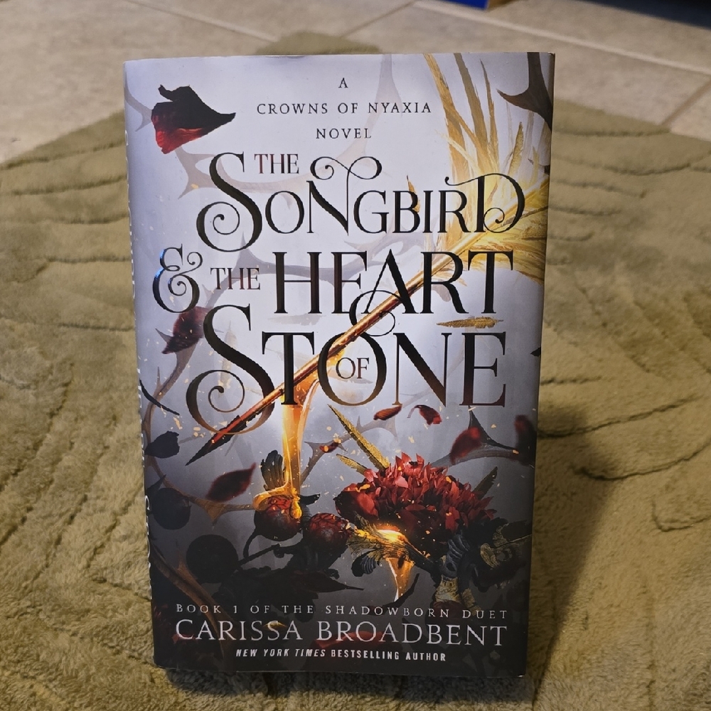 The Songbird & The Heart of Stone Book